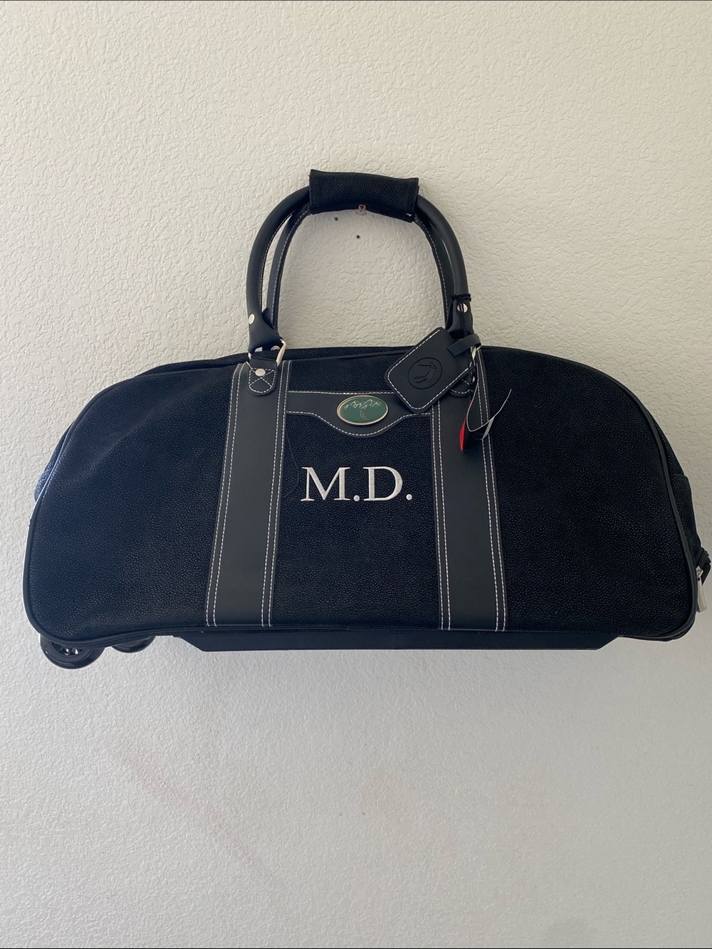 Sovrano Black  Novohyde Leather Wheeled Duffel Bag with Hideaway Handle NWOT